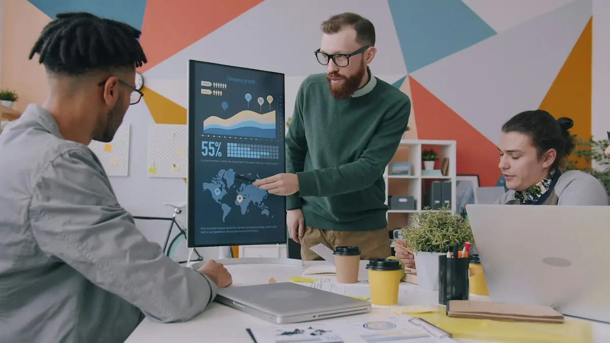 Personne présentant des graphiques de données sur un écran vertical